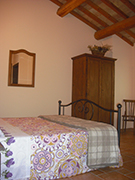 foto di una camera dell'agriturismo villa rosa